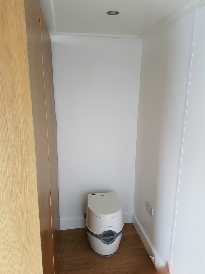 Chemical toilet within a garden office 